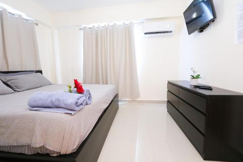 Cama o camas de una habitación en Edificio Amber
