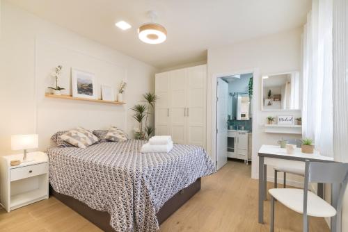 Postel nebo postele na pokoji v ubytování Madrid IFEMA suites