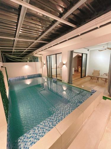 Kolam renang di atau dekat dengan Muji Home with Private Pool