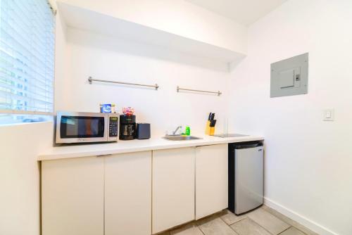 Kuchyň nebo kuchyňský kout v ubytování Charming Studio with Relaxed Comfort