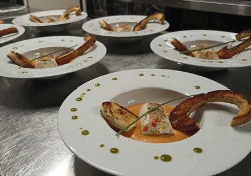 a group of plates of food on a table at La Sapinière St Lary Soulan in Saint-Lary-Soulan