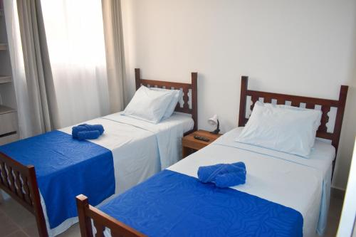 Una cama o camas en una habitación de Comfortable apartment close to the beach 2 rooms