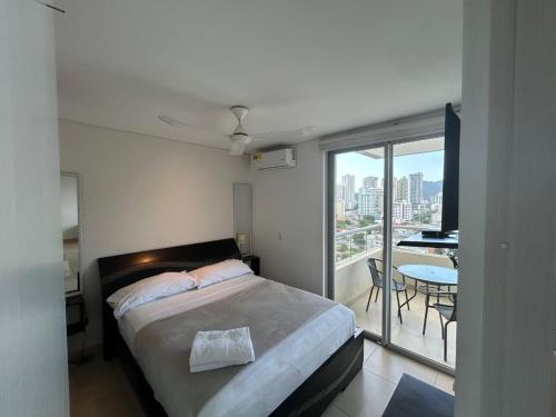 Ένα ή περισσότερα κρεβάτια σε δωμάτιο στο Apartamento luxury 1105A VM RODADERO