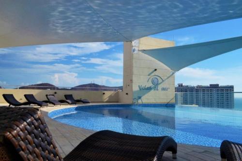 Πισίνα στο ή κοντά στο Apartamento luxury 1105A VM RODADERO
