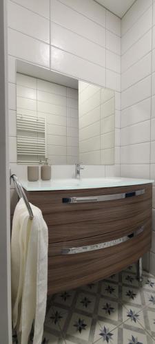 Et badeværelse på appartement plein centre ville