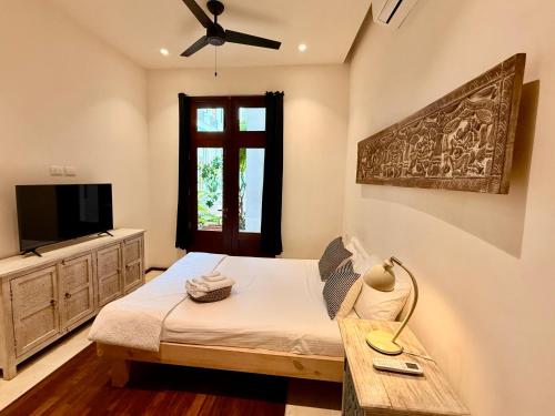 Katil atau katil-katil dalam bilik di Boutique Hotel Casa Grande, Mango Tango Suite