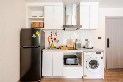 Dapur atau dapur kecil di Chiang Mai A1 Super Large Pool Condominium cook allowed with swiming Pool landscape Condominium 1 bedroom