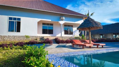 Afbeelding uit fotogalerij van Farashuu Luna Villas in Nungwi