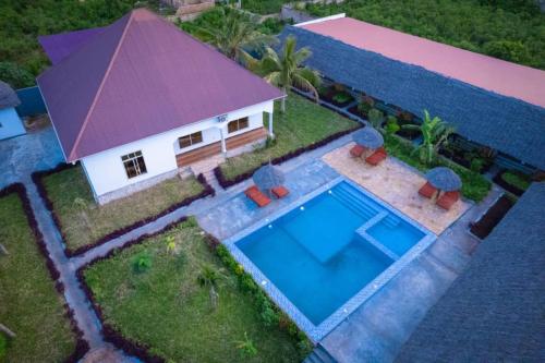 Afbeelding uit fotogalerij van Farashuu Luna Villas in Nungwi