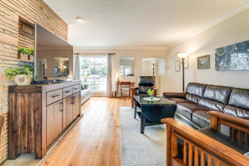 a living room with a couch and a table at 6 Mi to FIFA World Cup 2026 Great Bay Area Home! in Sunnyvale