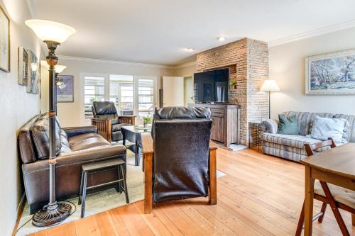 a living room with a couch and a table at 6 Mi to FIFA World Cup 2026 Great Bay Area Home! in Sunnyvale
