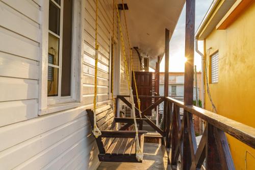 a porch of a house with a window at Casa De Shangrila in Belize City