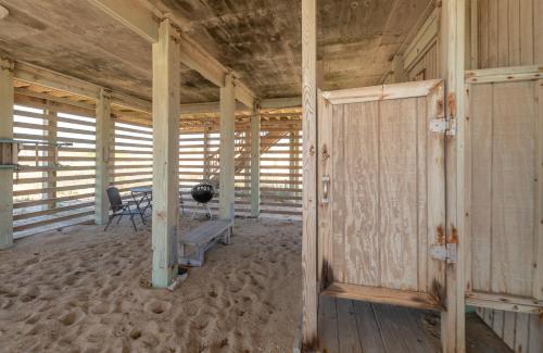 an inside view of a room with a table and chairs at Mitch's Haven in Kitty Hawk