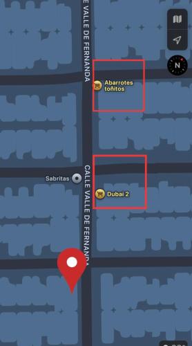 a screenshot of a cell phone with a red dot at Spacious Apartment Great Location in Matamoros in Matamoros