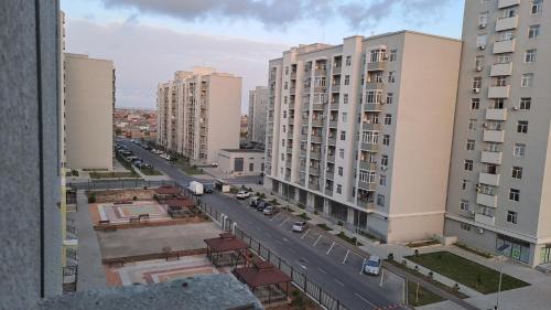 an aerial view of a city with tall buildings at Guest House Traveler in Baku
