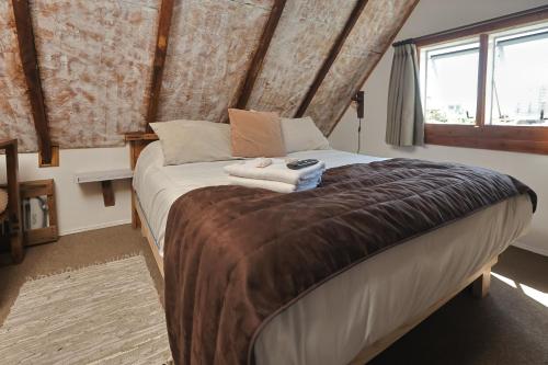 Ένα ή περισσότερα κρεβάτια σε δωμάτιο στο Rustika Hotel