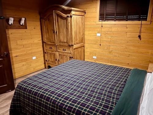 Postel nebo postele na pokoji v ubytování Chalets Gallix