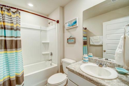 a bathroom with a sink and a toilet and a shower at Foley Vacation Rental 7 Mi to Gulf Shores Beaches in Foley