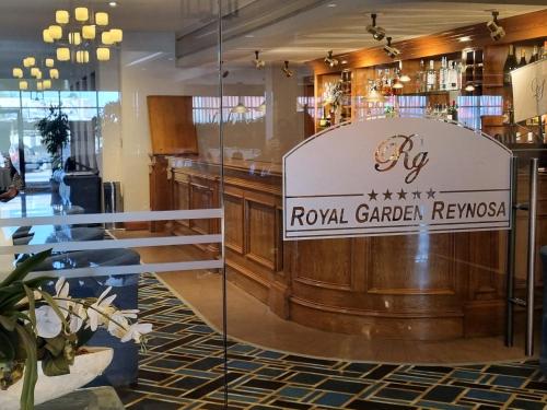 a bar with a sign that reads royal gardenrovaya at Royal Garden Reynosa in Reynosa