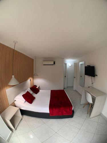 Postel nebo postele na pokoji v ubytování Hotel Santorini la 70