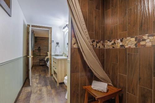 a bathroom with a toilet and a sink at Refined 6br Moose & Bear Lodge By Sweetheart Stay in Livingston