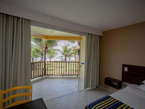 En eller flere senge i et værelse på Makai Resort All Inclusive Convention Aracaju