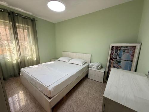 Ένα ή περισσότερα κρεβάτια σε δωμάτιο στο Scanderbeg Retreat