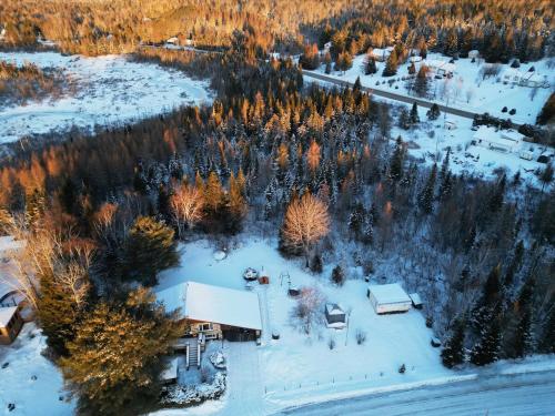 Το Charmant Chalet HUOT à Sainte-Lucie des-Laurentides τον χειμώνα