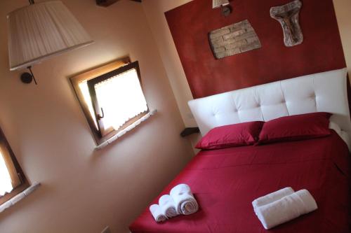 Кровать или кровати в номере Agriturismo Maloura