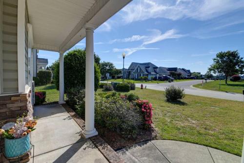 a porch of a house with a view of a street at The Carolina Comfort House in Rose Creek