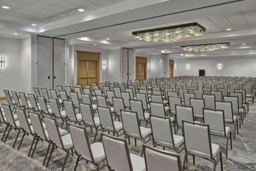 an empty hall with rows of chairs in a room at Salt Lake Marriott Downtown at City Creek in Salt Lake City