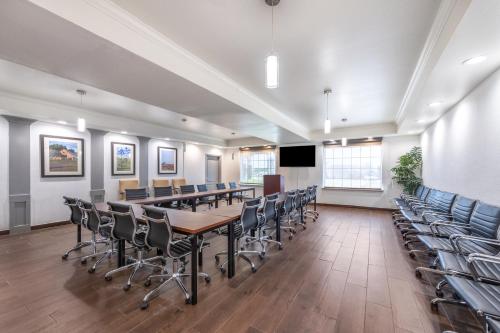 a conference room with a long table and chairs at Comfort Suites Texarkana Texas in Texarkana - Texas