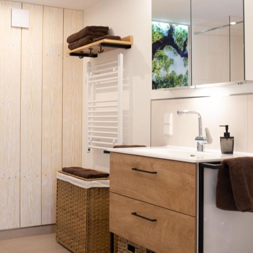 a kitchen with a sink and a counter top at Bei Heussens in Waldbronn