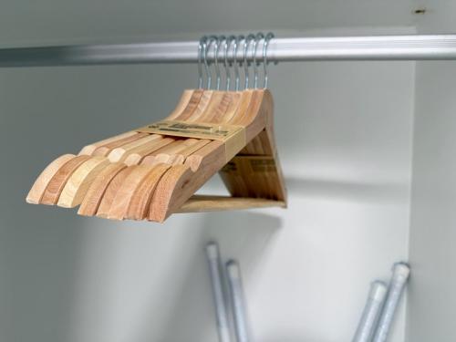 a wooden rack hanging from a refrigerator at Spacious 1 Bedroom, with sofa bed and Balcony in Kathu