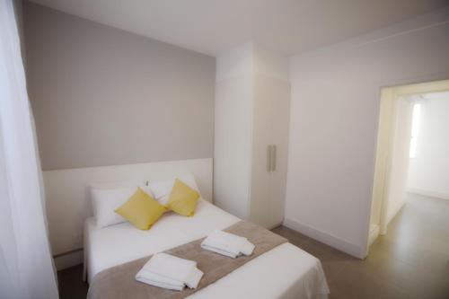 Ένα ή περισσότερα κρεβάτια σε δωμάτιο στο Sugar Loft Apartments
