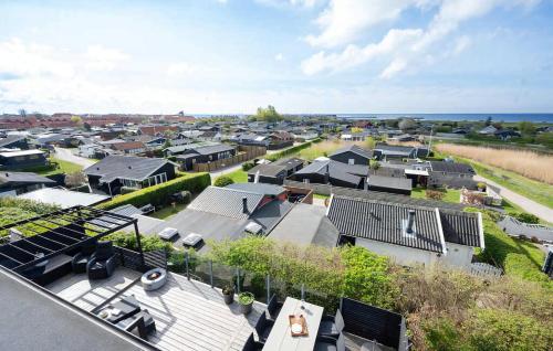 an aerial view of a suburb with houses at Deligt Feriehus Med Havudsigt in Karrebæksminde