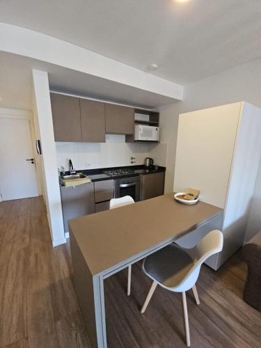 Kuchyň nebo kuchyňský kout v ubytování Alquiler Temporario Rosario 27