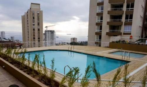 Bazén v ubytování Viña del Mar Departamento entero Estar Infinito nebo v jeho okolí