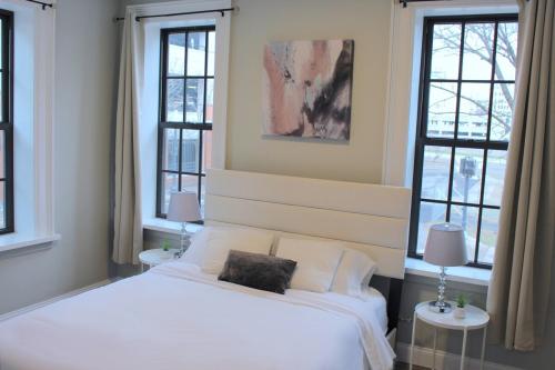 Ένα ή περισσότερα κρεβάτια σε δωμάτιο στο WOW Bright Apt PRIME downtown Walk Everywhere