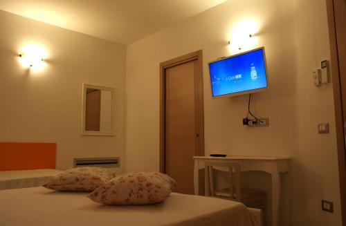 En eller flere senge i et værelse på Il Marchese Residenza Fiore