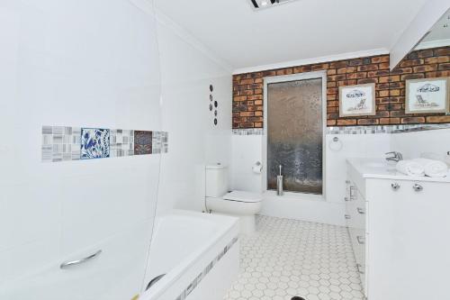 Ένα μπάνιο στο Treehouse Waterview