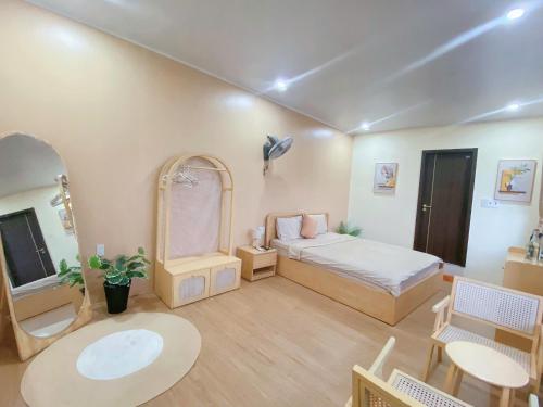 Katil atau katil-katil dalam bilik di Minh Anh Homestay