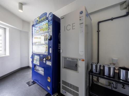 a large blue vending machine in a room at KOKO HOTEL Yokohama Tsurumi in Yokohama