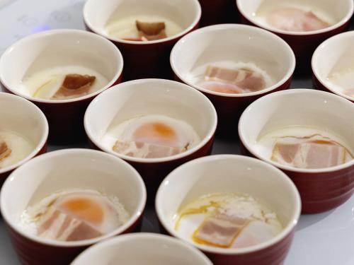 a group of cups filled with different types of food at KOKO HOTEL Yokohama Tsurumi in Yokohama