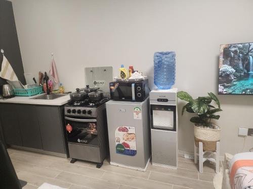 Dapur atau dapur kecil di Farrey Homes Studio Near Jkia and Sgr