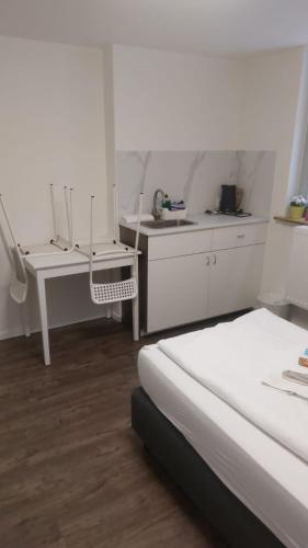Haus99 Budget Pension & Apartmentsにあるキッチンまたは簡易キッチン