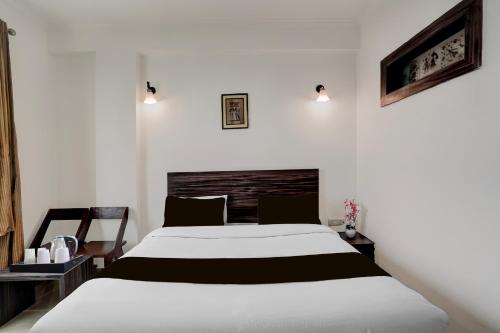Collection O Vaishno Devi Temple Formerly Hotel The Leafにあるベッド