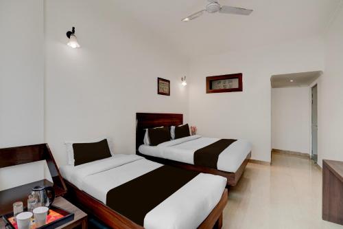 Collection O Vaishno Devi Temple Formerly Hotel The Leafにあるベッド