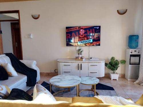 Χώρος καθιστικού στο Cutie Coast Retreat 2BR Getaway