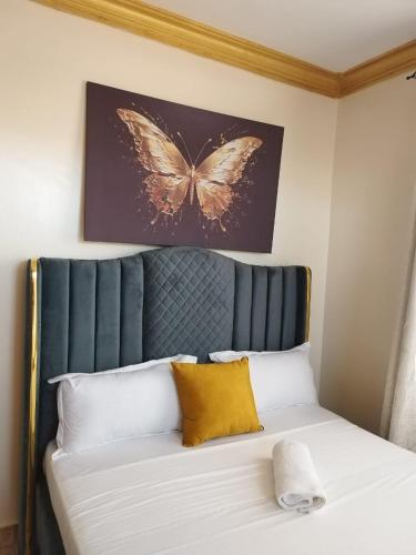Ένα ή περισσότερα κρεβάτια σε δωμάτιο στο Cutie Coast Retreat 2BR Getaway